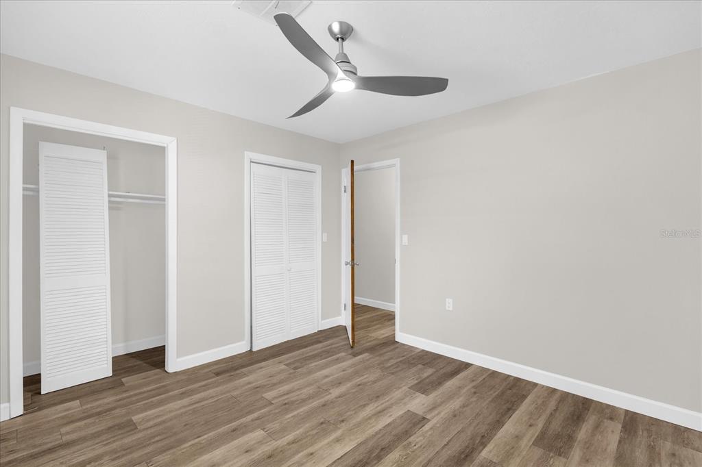 3800 Pine Street Cocoa, FL 32926 - Photo 19 of 31 a view of an empty room with wooden floor