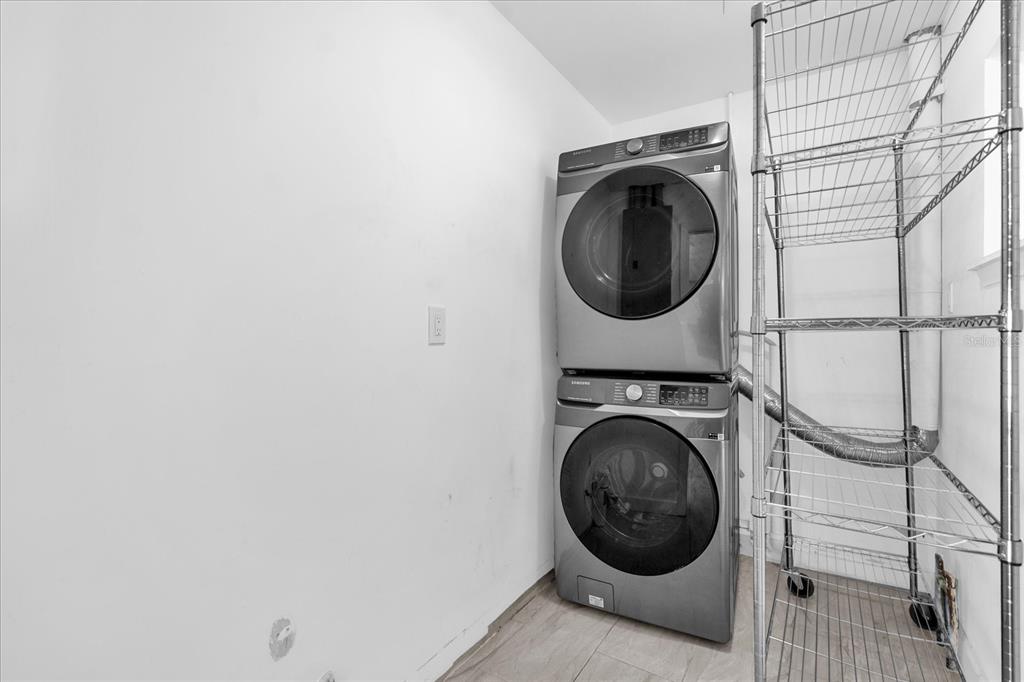 3800 Pine Street Cocoa, FL 32926 - Photo 21 of 31 a view of a hallway with washer and dryer
