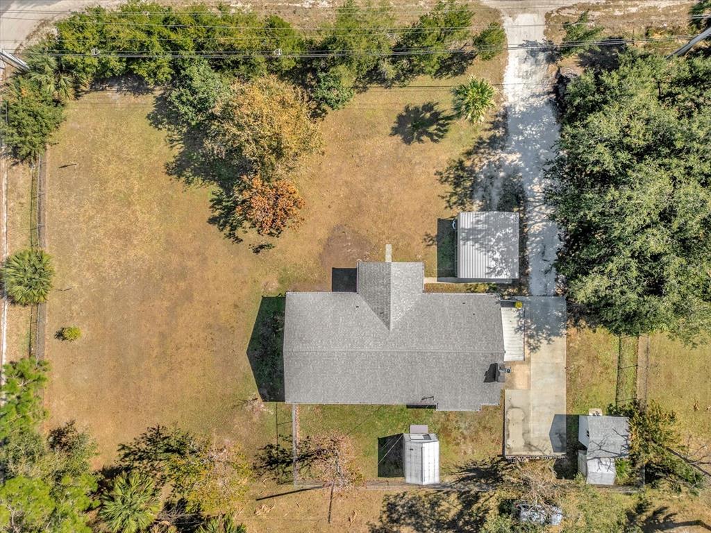 3800 Pine Street Cocoa, FL 32926 - Photo 28 of 31 an aerial view of residential houses with outdoor space