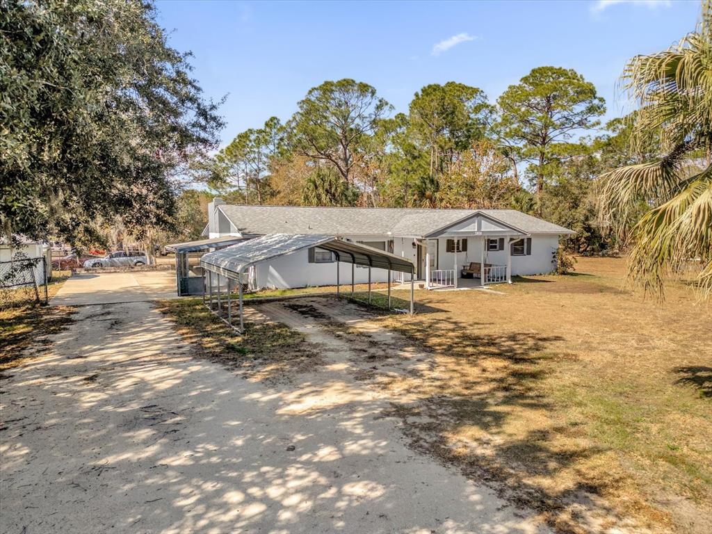 3800 Pine Street Cocoa, FL 32926 - Photo 3 of 31 a house with trees in front of it