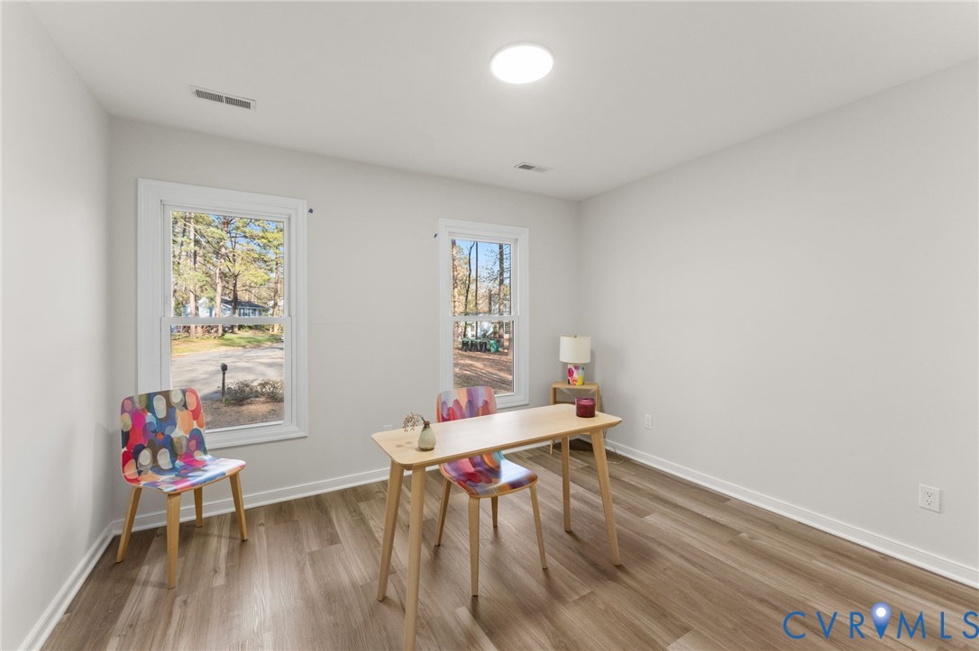 10209 Stonemill Road Henrico, VA 23233 - Photo 20 of 28 a workspace with furniture window and wooden floor