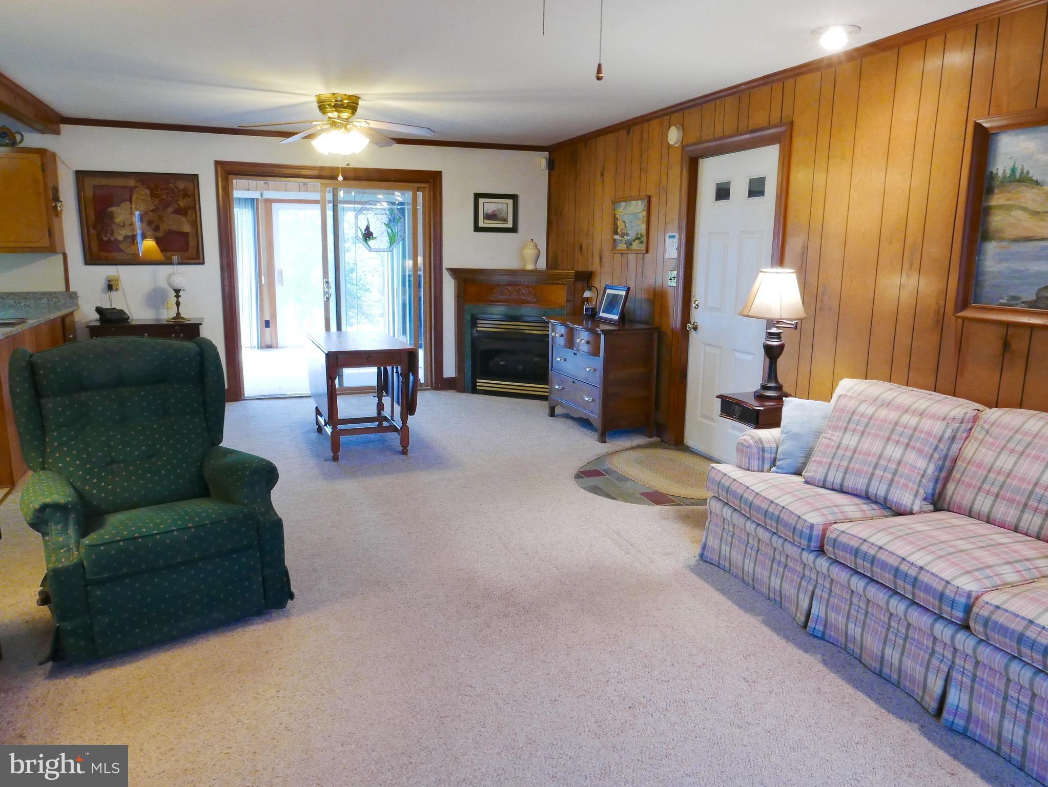 2978 Back Landing Road Preston, MD 21655 - Photo 13 of 30 Family Room- Door to 2-car Garage & Sunroom