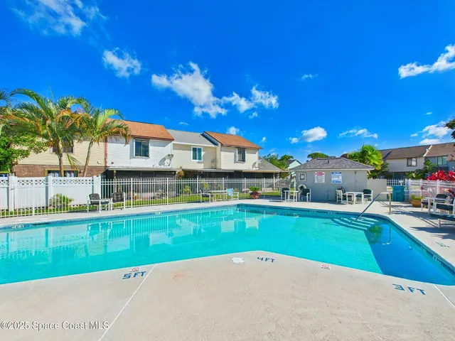a view of a house with a swimming pool