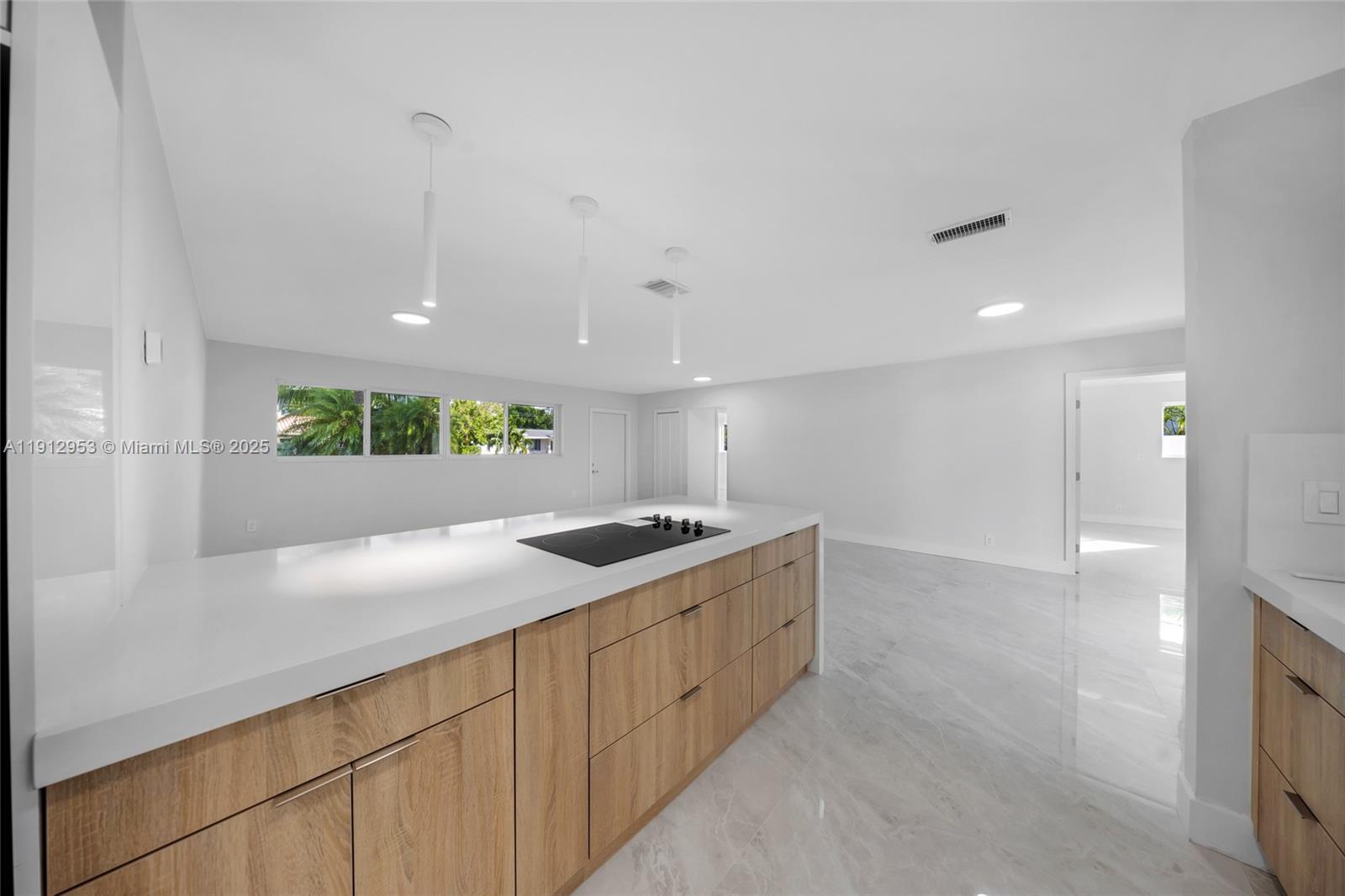 4500 Monroe Street Hollywood, FL 33021 - Photo 17 of 67 a kitchen with a sink and stove