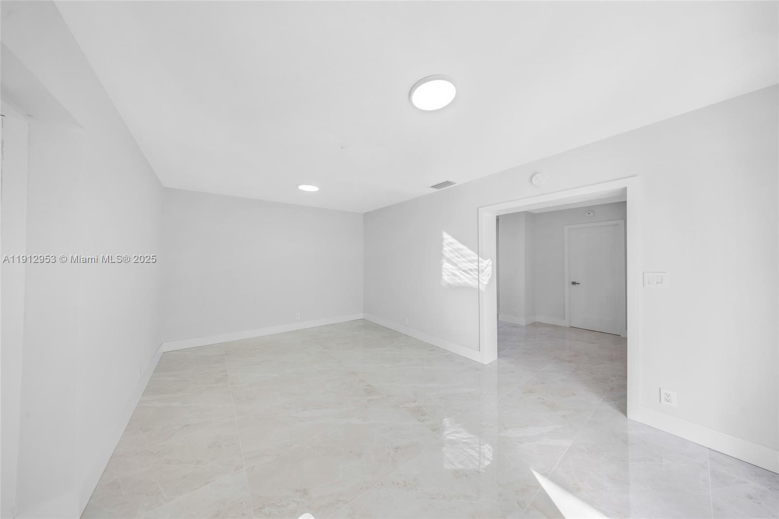 4500 Monroe Street Hollywood, FL 33021 - Photo 23 of 67 a view of an empty room with a window