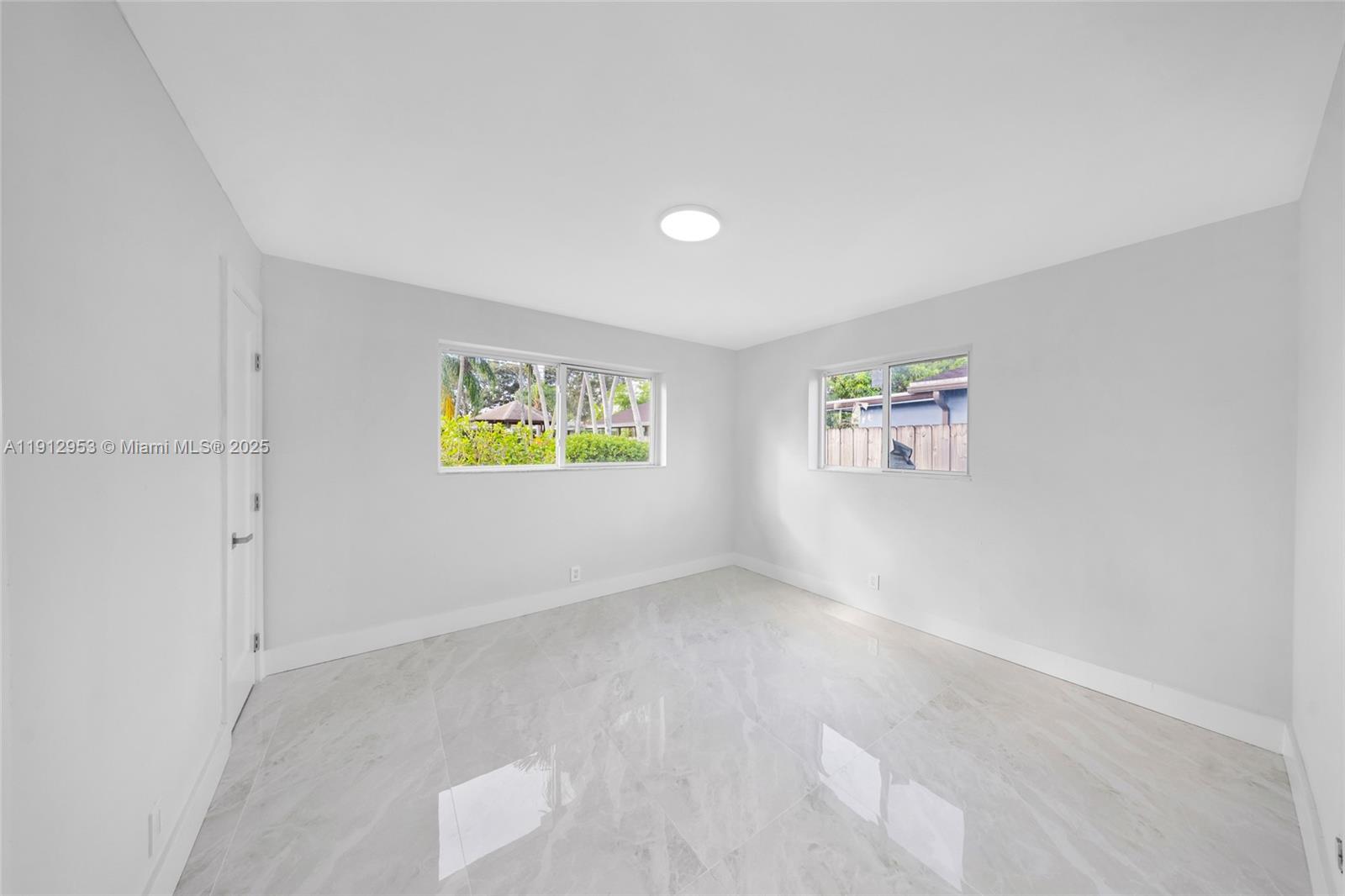 4500 Monroe Street Hollywood, FL 33021 - Photo 26 of 67 a view of an empty room with a window