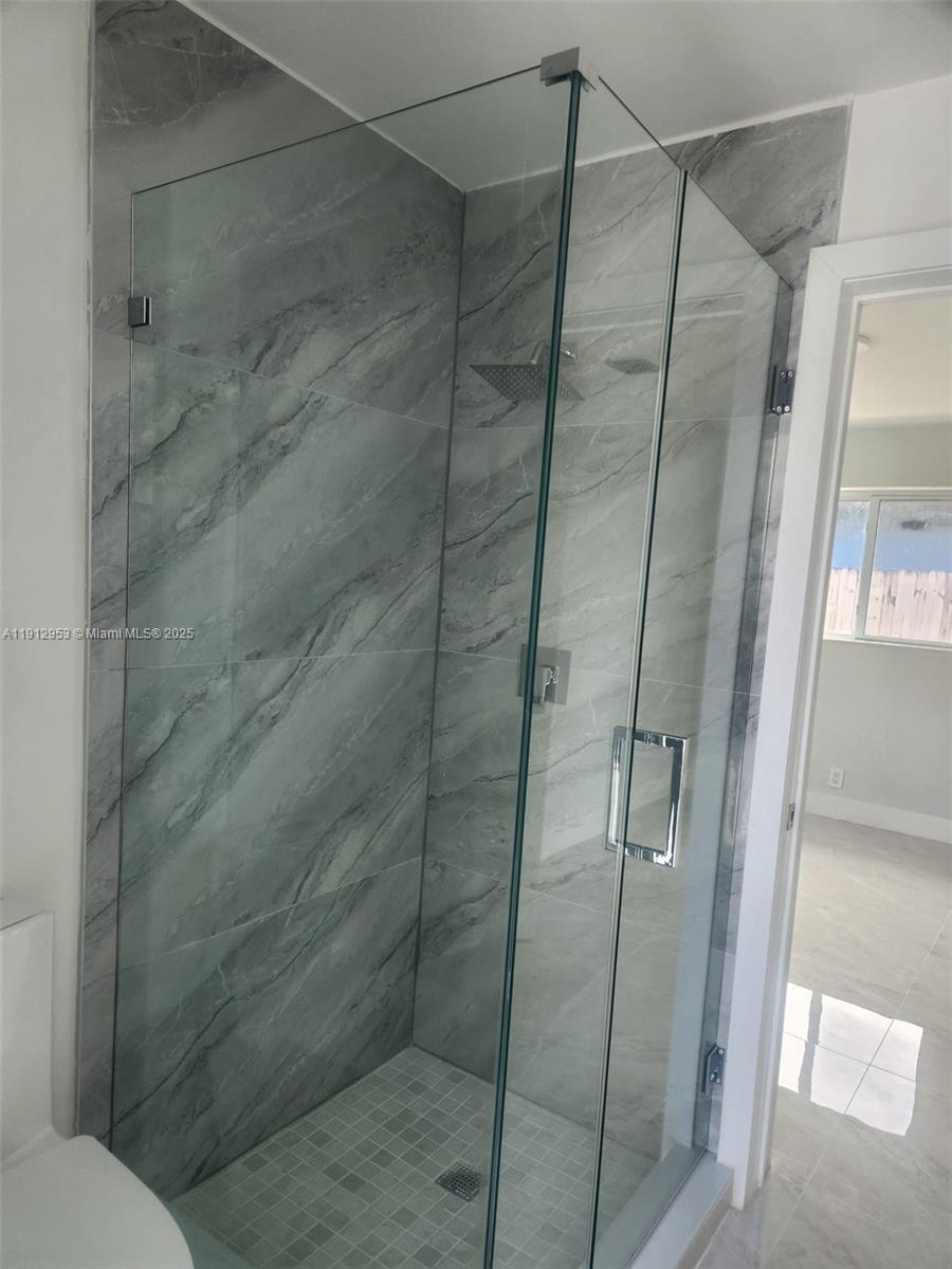 4500 Monroe Street Hollywood, FL 33021 - Photo 32 of 67 a bathroom with a shower