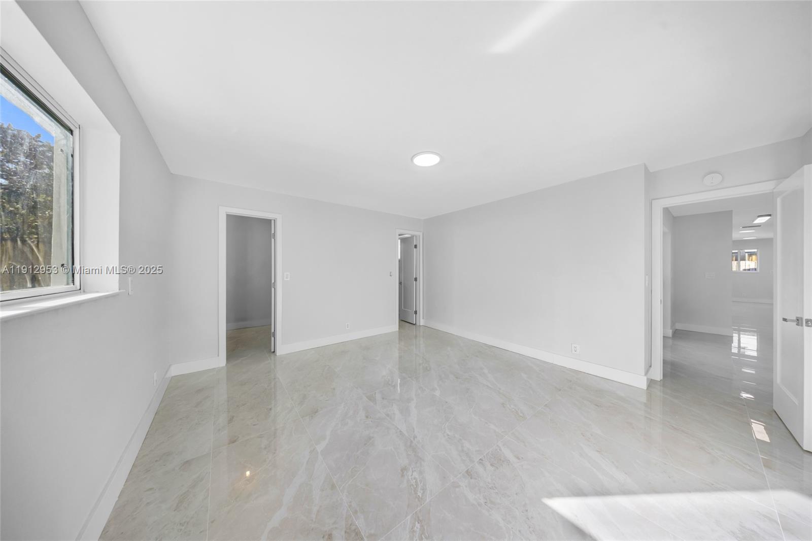 4500 Monroe Street Hollywood, FL 33021 - Photo 36 of 67 a view of an empty room with a window