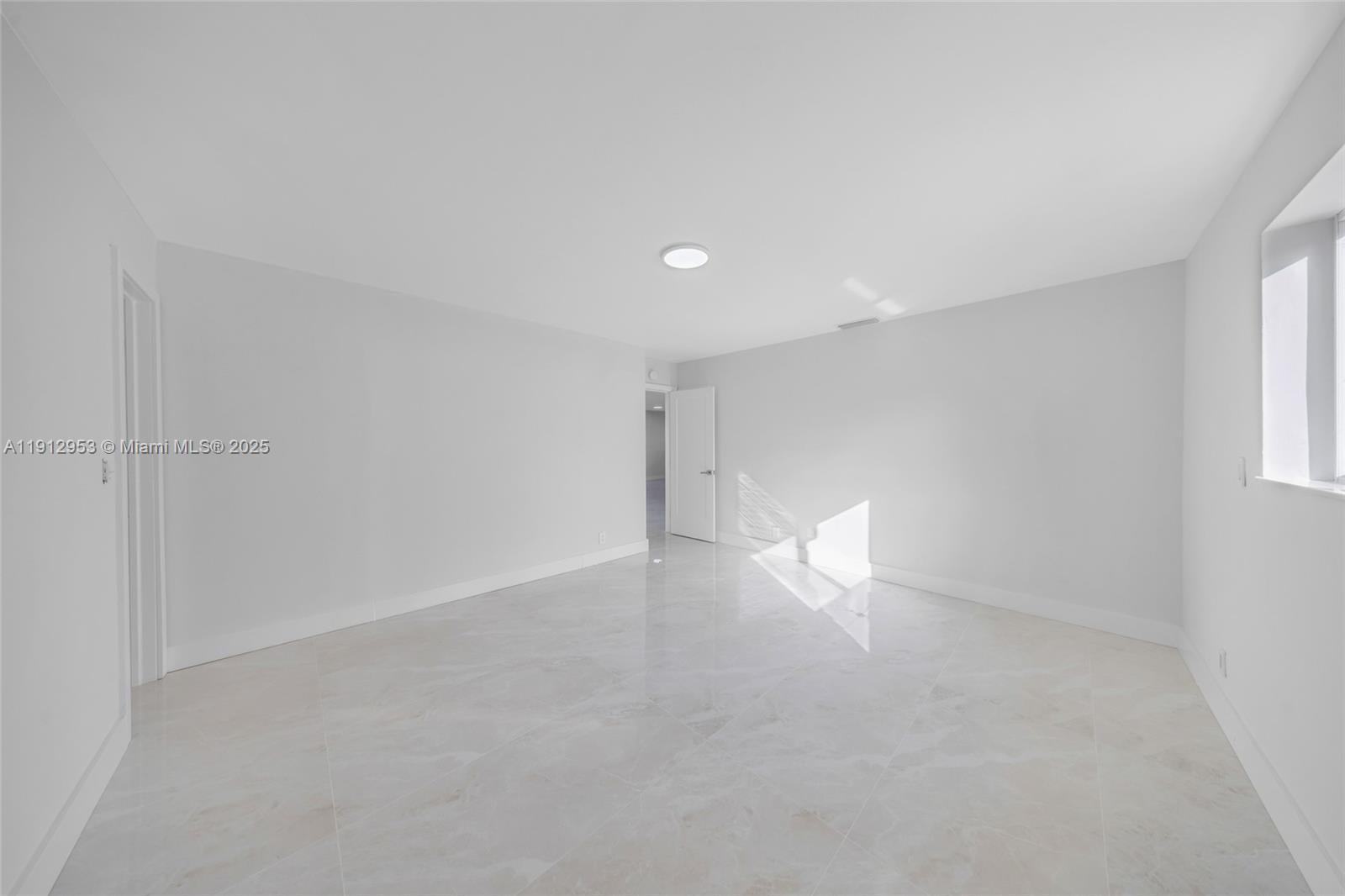 4500 Monroe Street Hollywood, FL 33021 - Photo 38 of 67 a view of an empty room with a window
