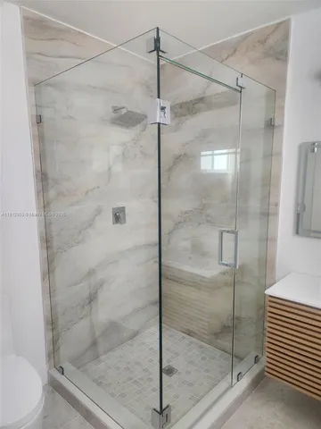 a view of a house with a street from a porch