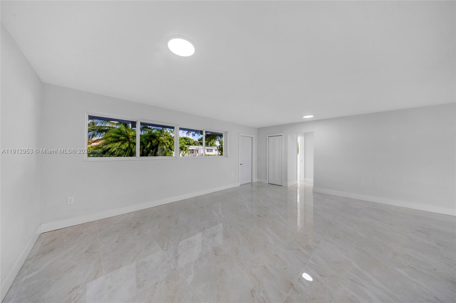 4500 Monroe Street Hollywood, FL 33021 - Photo 7 of 67 an empty room with windows