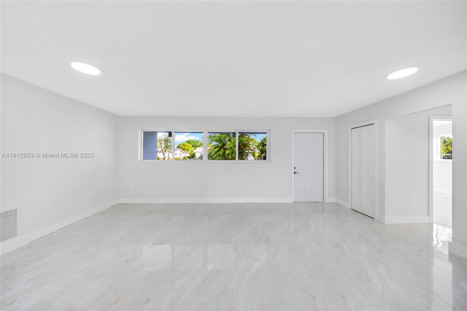 4500 Monroe Street Hollywood, FL 33021 - Photo 8 of 67 an empty room with windows