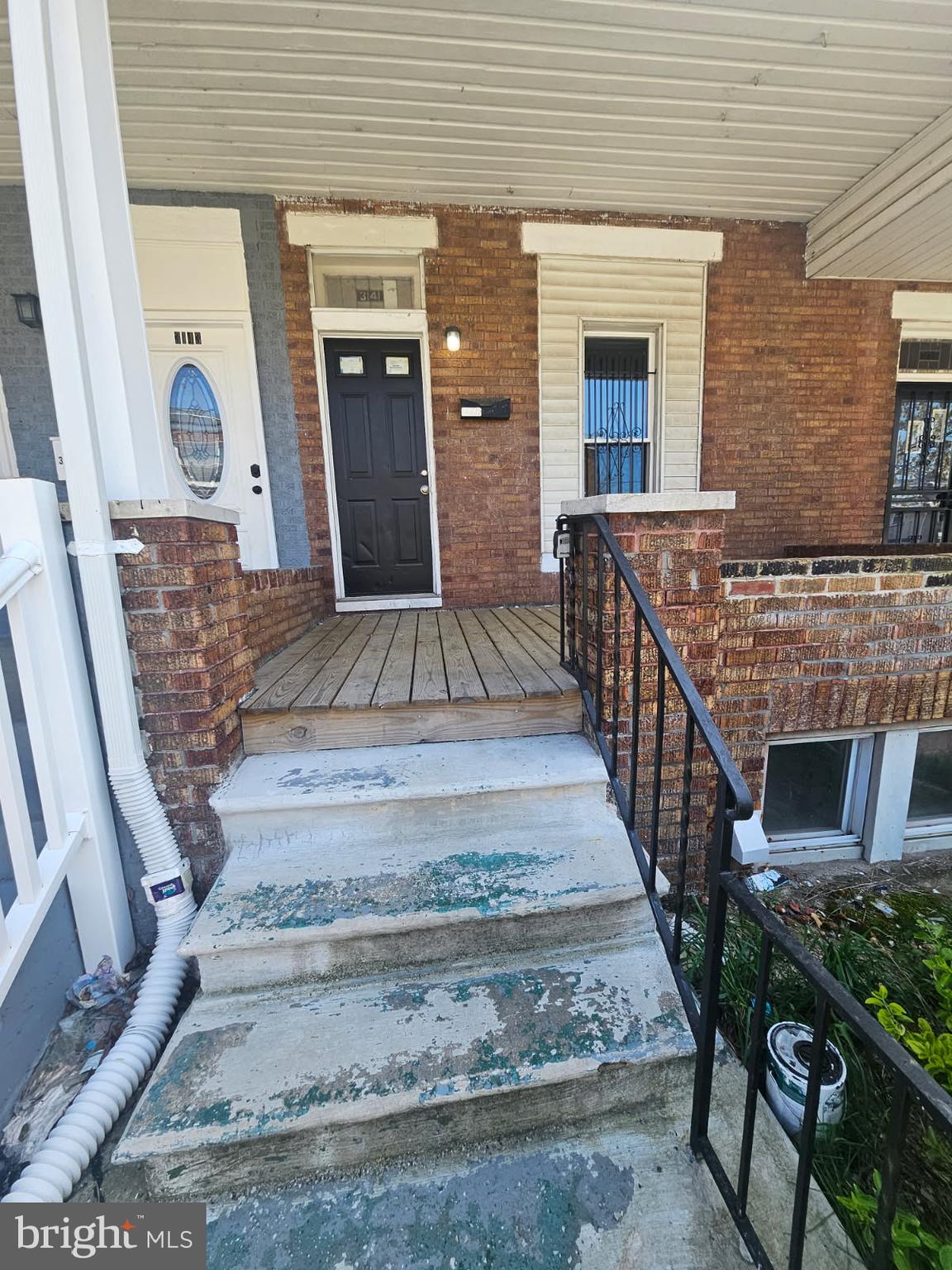 3141 Elmora Avenue Baltimore, MD 21213 - Photo 2 of 2 a view of entryway livingroom and hall