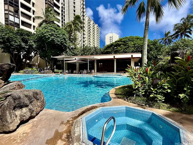 a front view of house with yard and trees