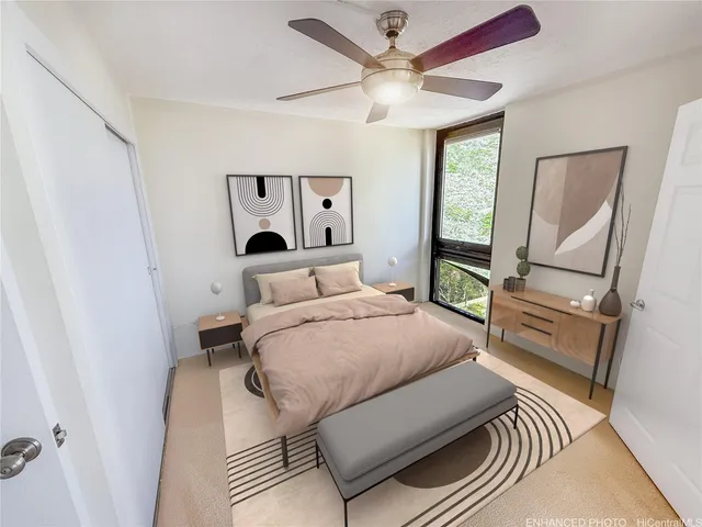 a bedroom with a bed and a mirror