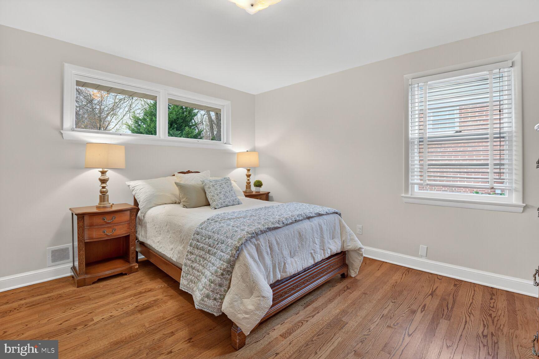 10704 Jamaica Drive Silver Spring, MD 20902 - Photo 11 of 26 a bedroom with a bed and window