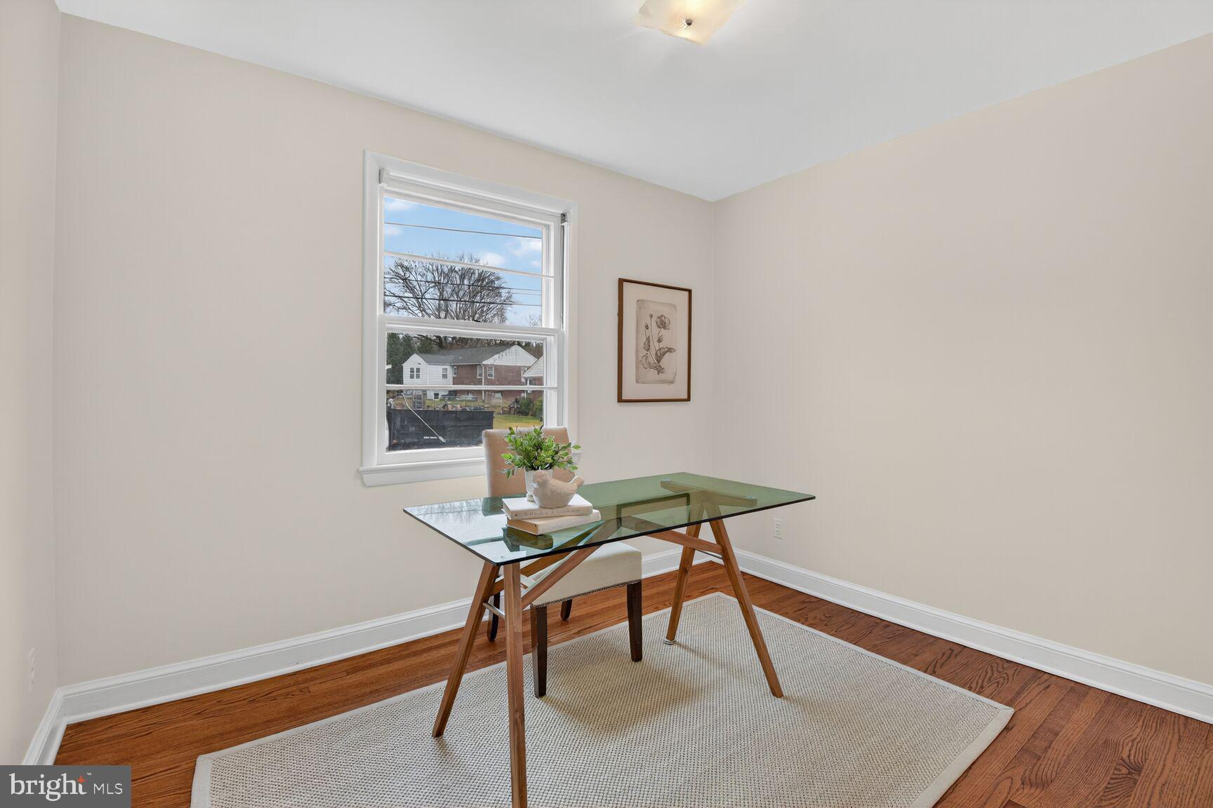 10704 Jamaica Drive Silver Spring, MD 20902 - Photo 16 of 26 a workspace room with furniture and wooden floor