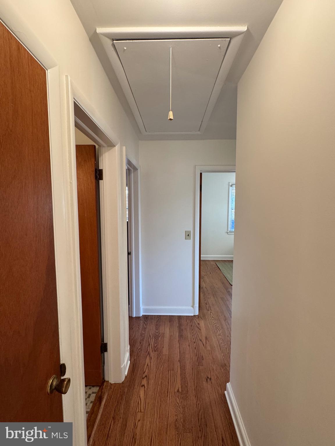 10704 Jamaica Drive Silver Spring, MD 20902 - Photo 18 of 26 a view of a hallway with wooden floor