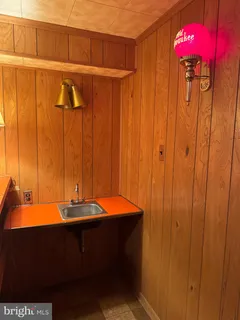 a room with a table and chairs