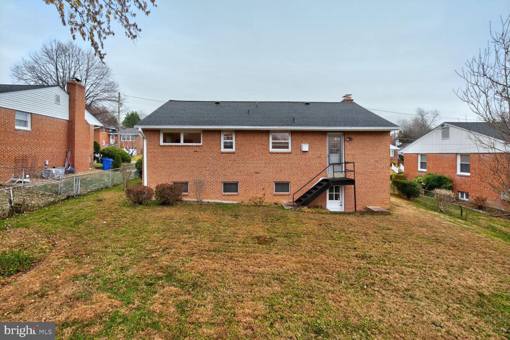 10704 Jamaica Drive Silver Spring, MD 20902 - Photo 24 of 26 a view of a house with a yard