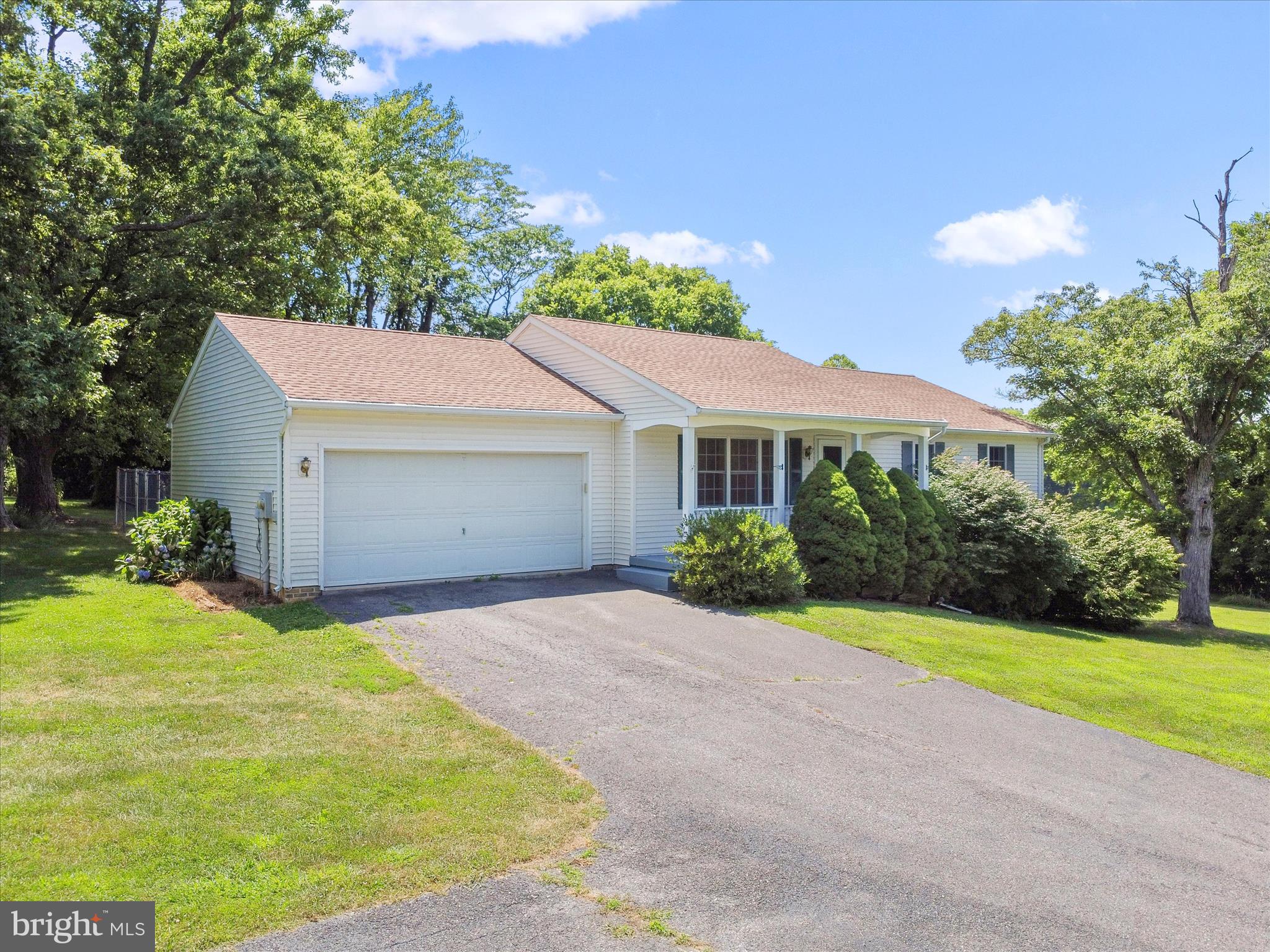 19135 Swinging Bridge Road Boonsboro, MD 21713 - Photo 1 of 38 a view of a house with a yard and potted plants