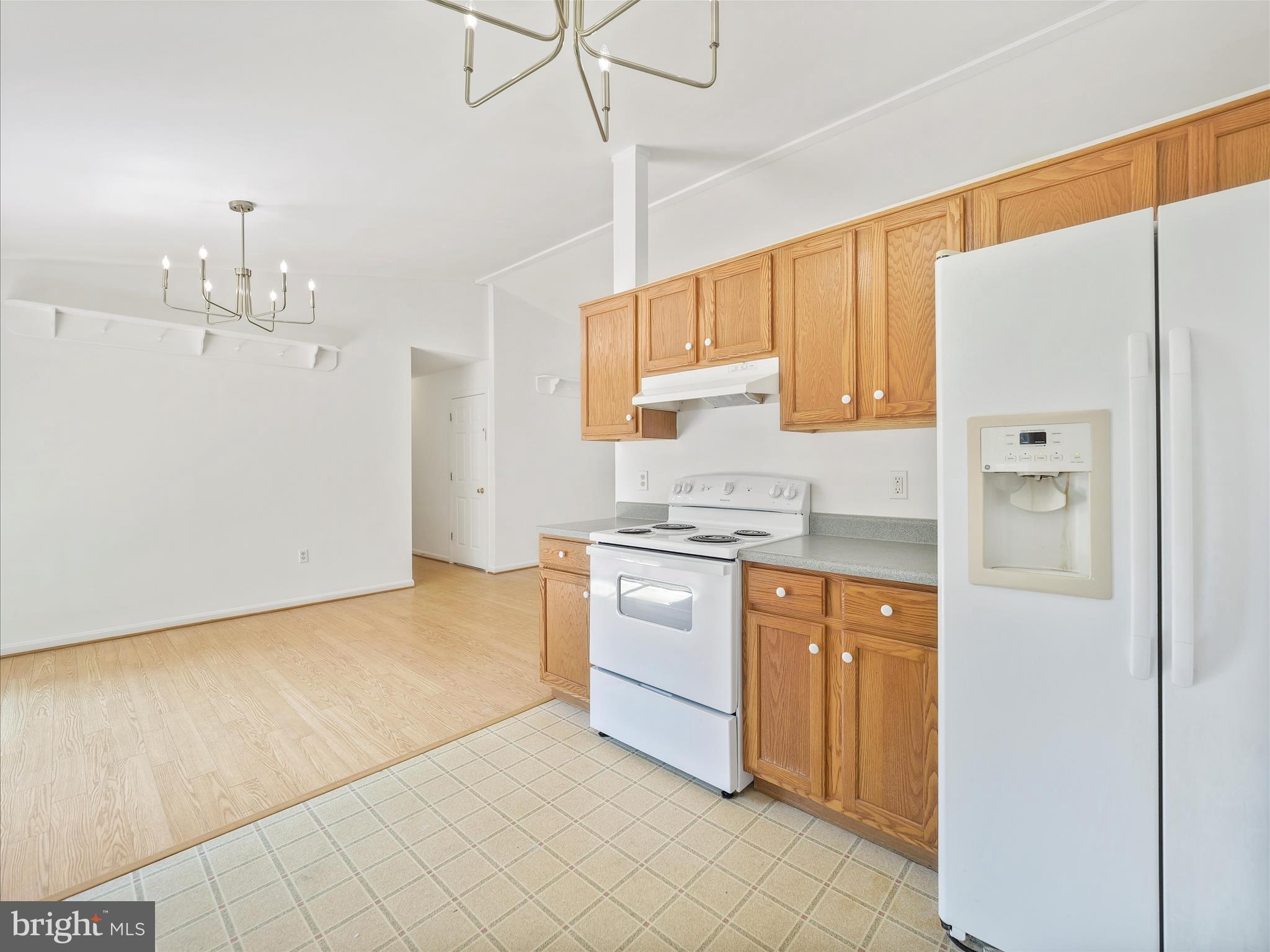 19135 Swinging Bridge Road Boonsboro, MD 21713 - Photo 14 of 38 a kitchen with stainless steel appliances a refrigerator sink and cabinets