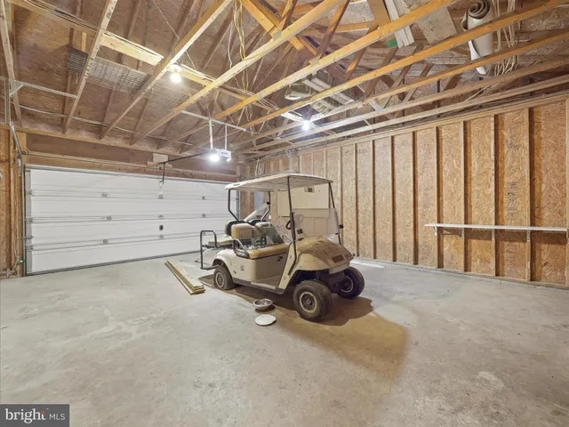 a kitchen with stainless steel appliances a refrigerator sink and cabinets