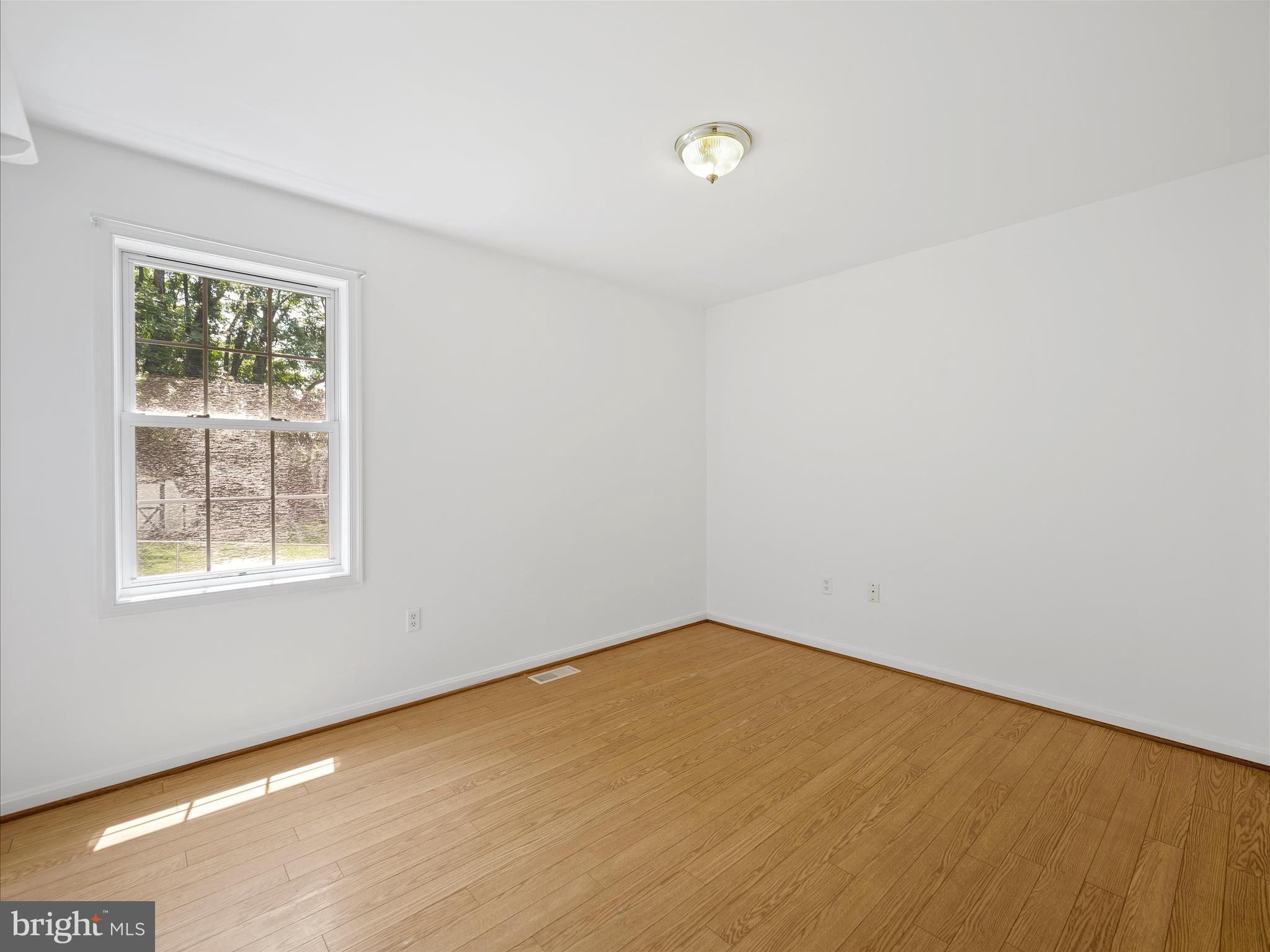 19135 Swinging Bridge Road Boonsboro, MD 21713 - Photo 19 of 38 an empty room with a window