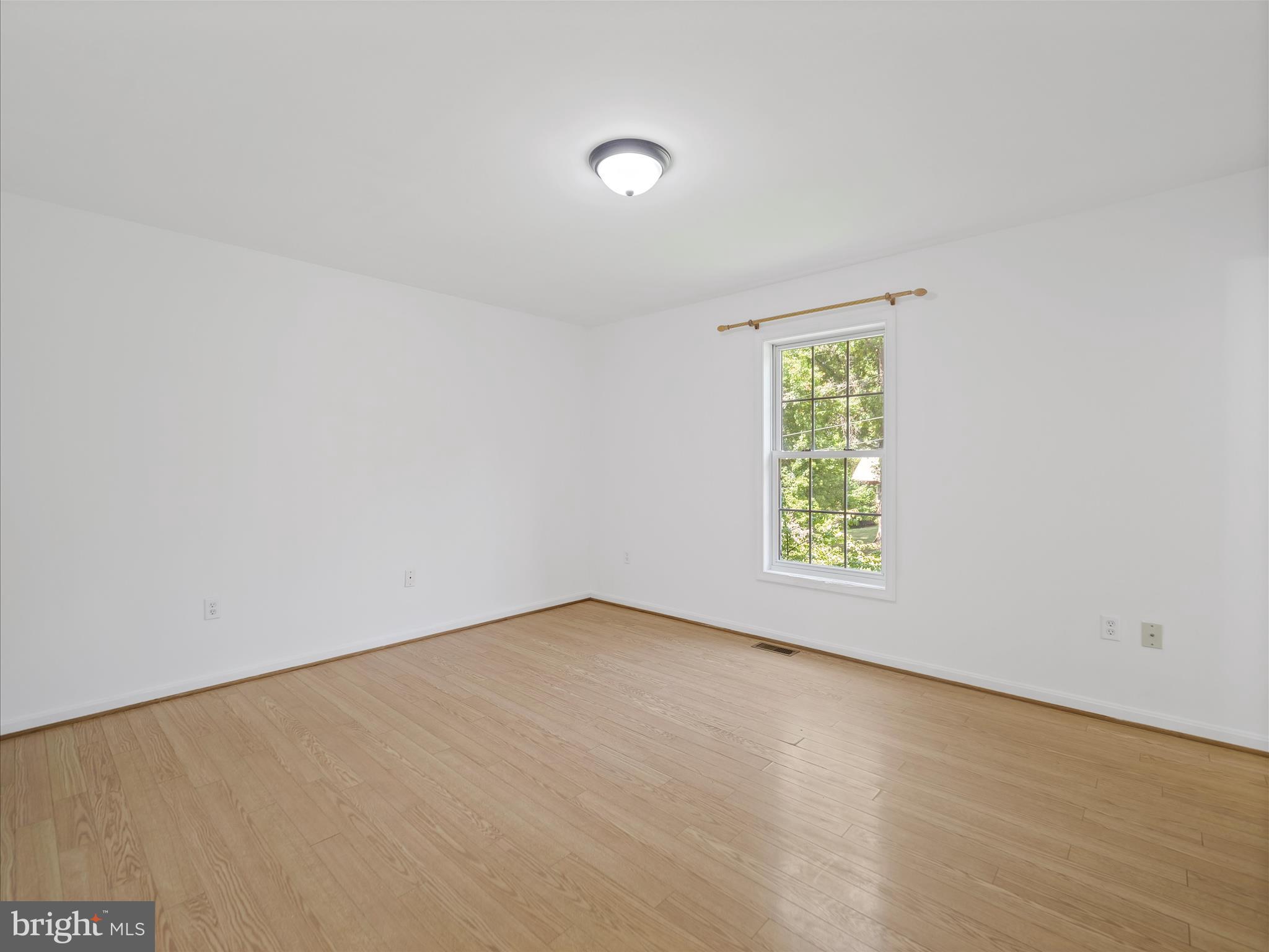 19135 Swinging Bridge Road Boonsboro, MD 21713 - Photo 21 of 38 an empty room with a window