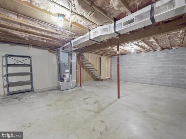 a view of empty room with storage