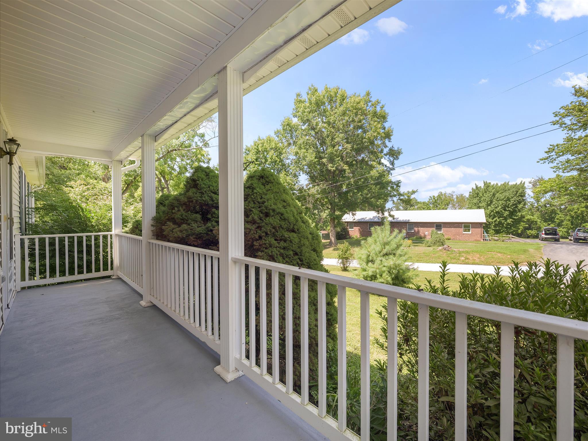 19135 Swinging Bridge Road Boonsboro, MD 21713 - Photo 5 of 38 a view of a wooden deck next to a yard