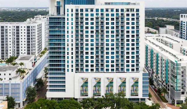 a view of a city with tall buildings