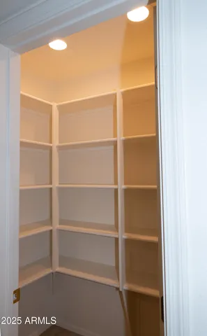 a white refrigerator freezer sitting inside of a kitchen