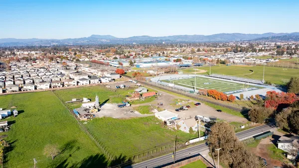 a view of a city with ocean view