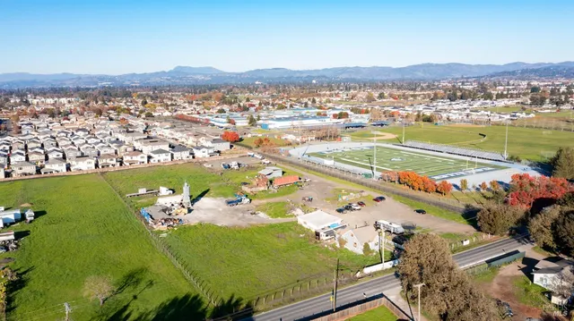 a view of a city with ocean view
