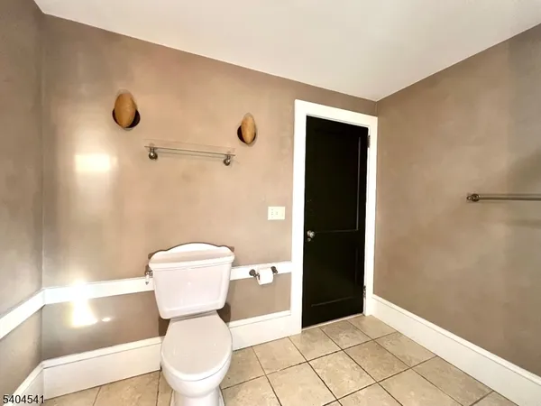 a bathroom with a toilet
