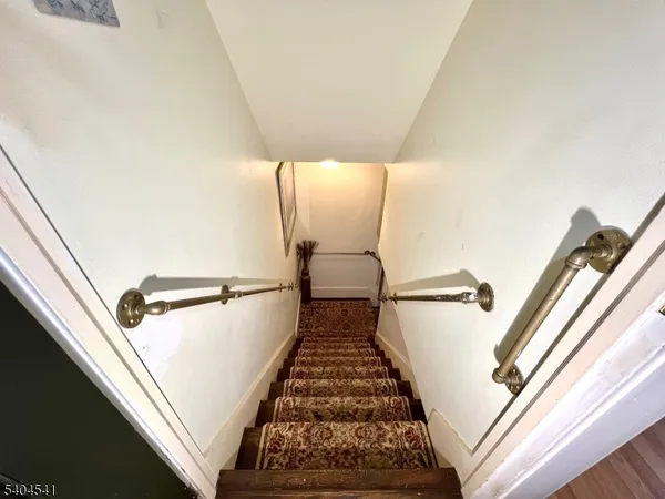 a view of balcony with furniture