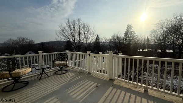 a view of deck with furniture