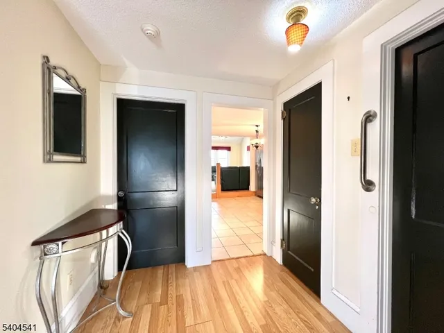 a view of a kitchen with a refrigerator and a refrigerator
