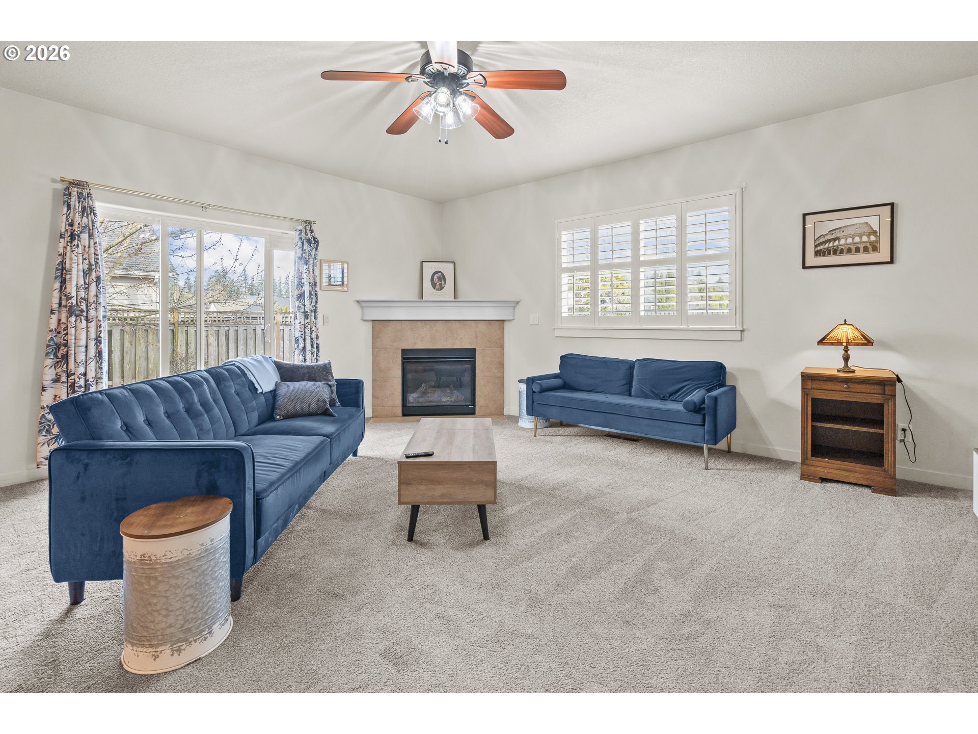 1018 Taurus Loop Northeast Keizer, OR 97303 - Photo 14 of 47 a living room with furniture and a fireplace