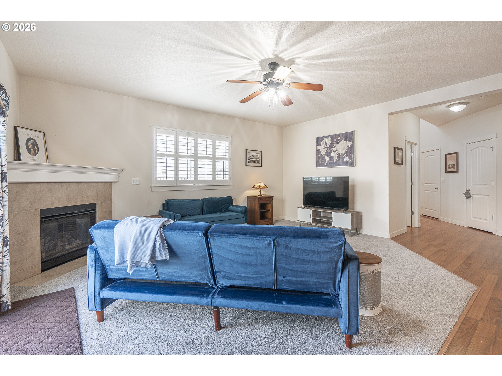 1018 Taurus Loop Northeast Keizer, OR 97303 - Photo 15 of 47 a living room with furniture and a fireplace