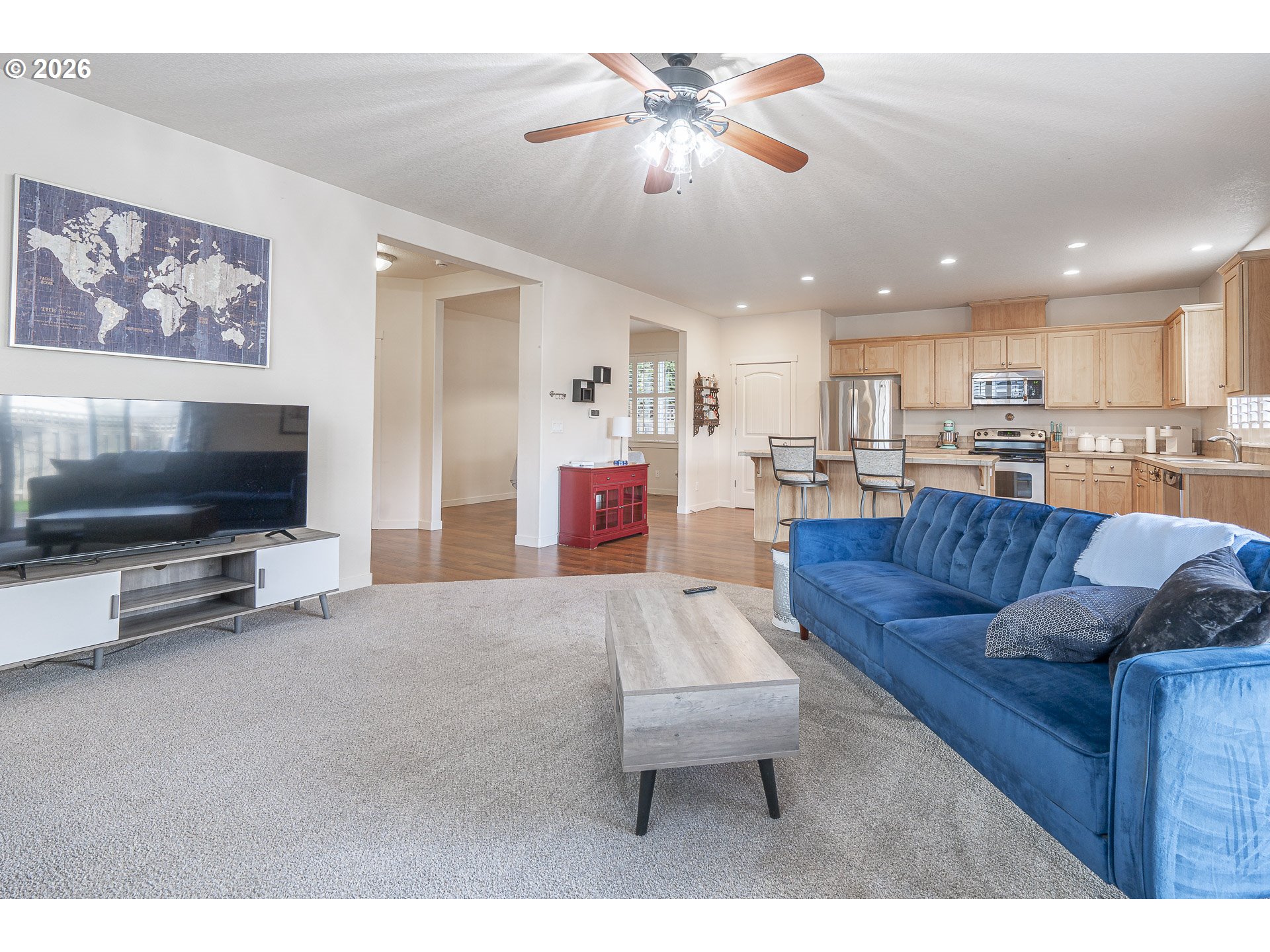 1018 Taurus Loop Northeast Keizer, OR 97303 - Photo 17 of 47 a living room with furniture and a flat screen tv