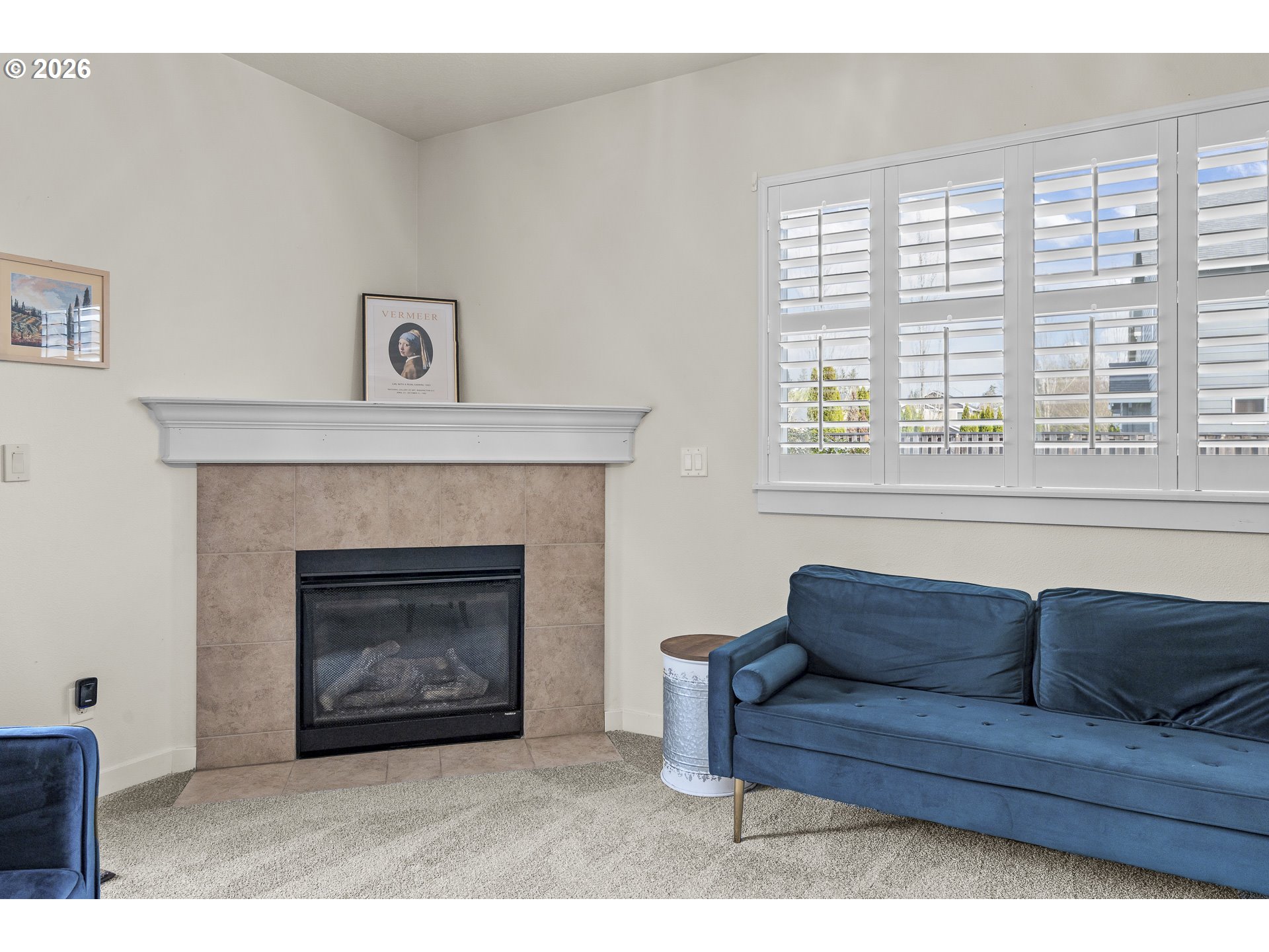 1018 Taurus Loop Northeast Keizer, OR 97303 - Photo 19 of 47 a living room with furniture a window and a fireplace