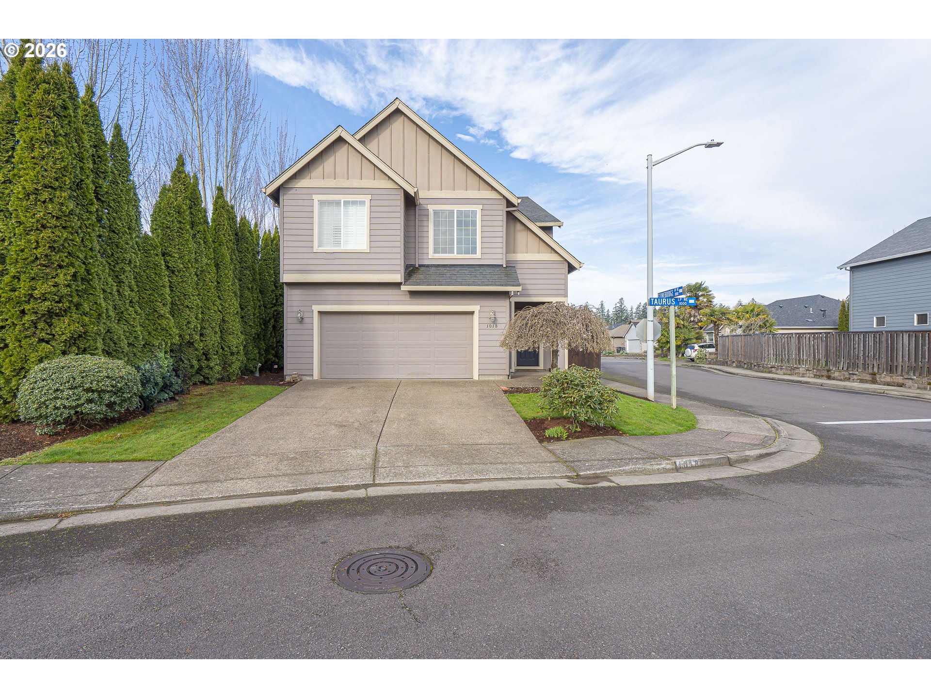 1018 Taurus Loop Northeast Keizer, OR 97303 - Photo 40 of 47 a view of a house with a yard and garage