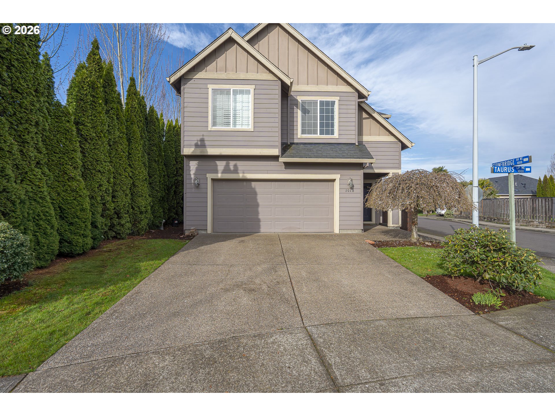 1018 Taurus Loop Northeast Keizer, OR 97303 - Photo 41 of 47 a front view of a house with garden