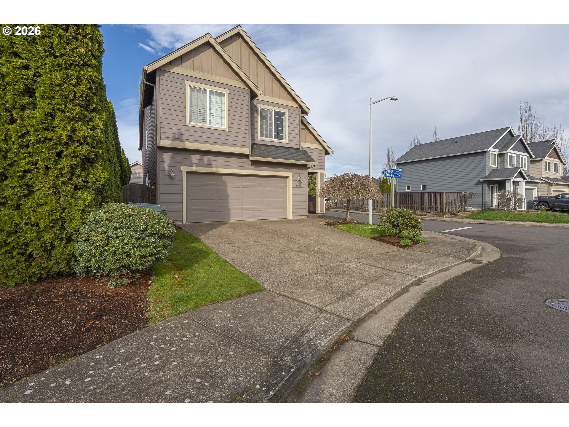 1018 Taurus Loop Northeast Keizer, OR 97303 - Photo 42 of 47 a view of a house with a yard and garage