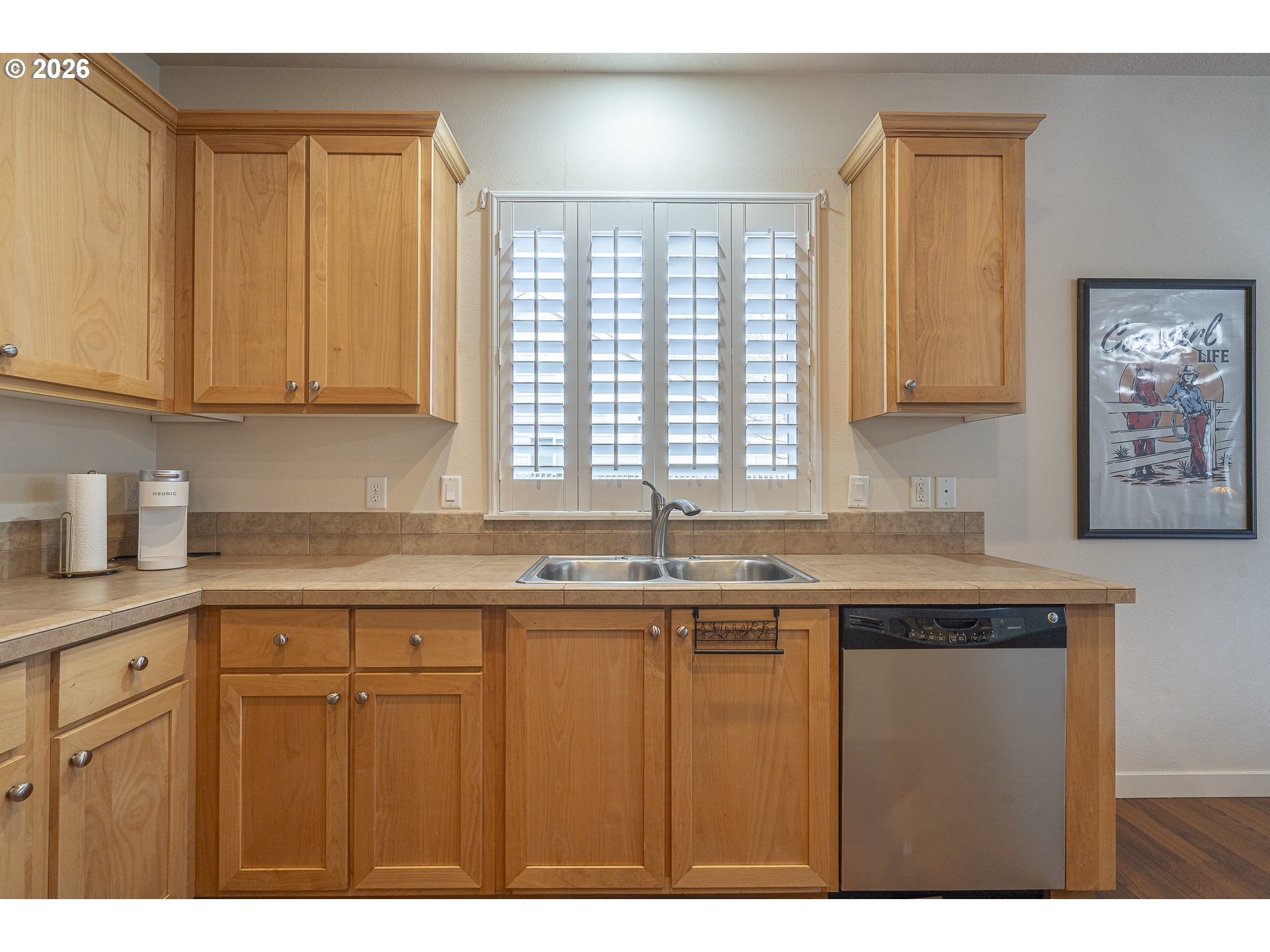 1018 Taurus Loop Northeast Keizer, OR 97303 - Photo 9 of 47 a kitchen with stainless steel appliances granite countertop a sink a stove and cabinets