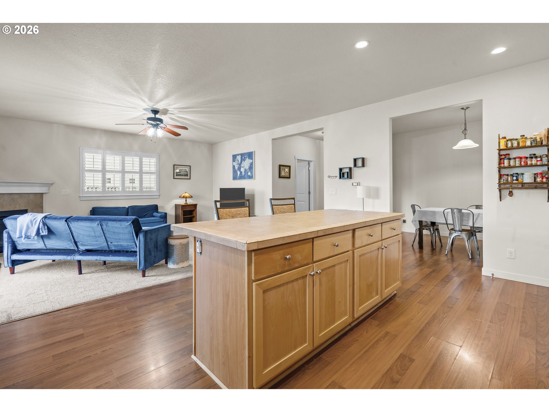 1018 Taurus Loop Northeast Keizer, OR 97303 - Photo 10 of 47 a open kitchen with sink cabinets and wooden floor