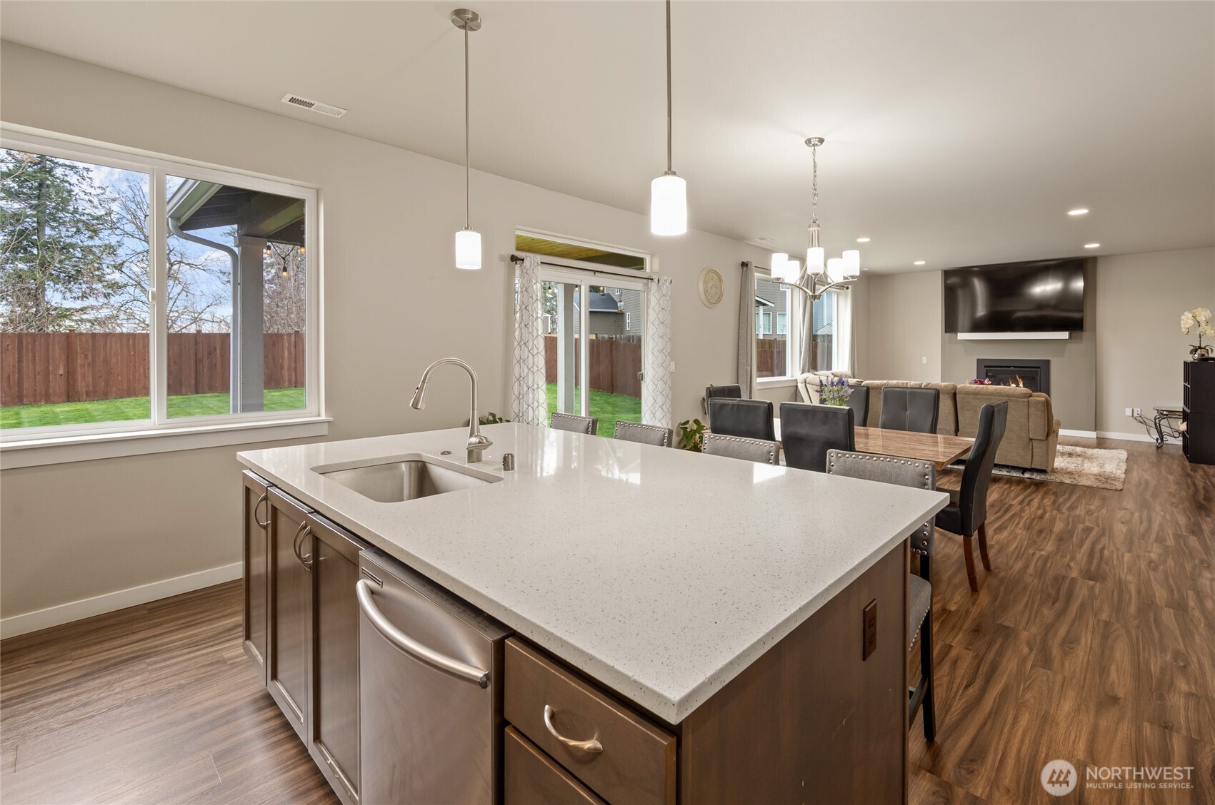 711 10th Street Sultan, WA 98294 - Photo 11 of 30 a large kitchen with kitchen island a large island in it