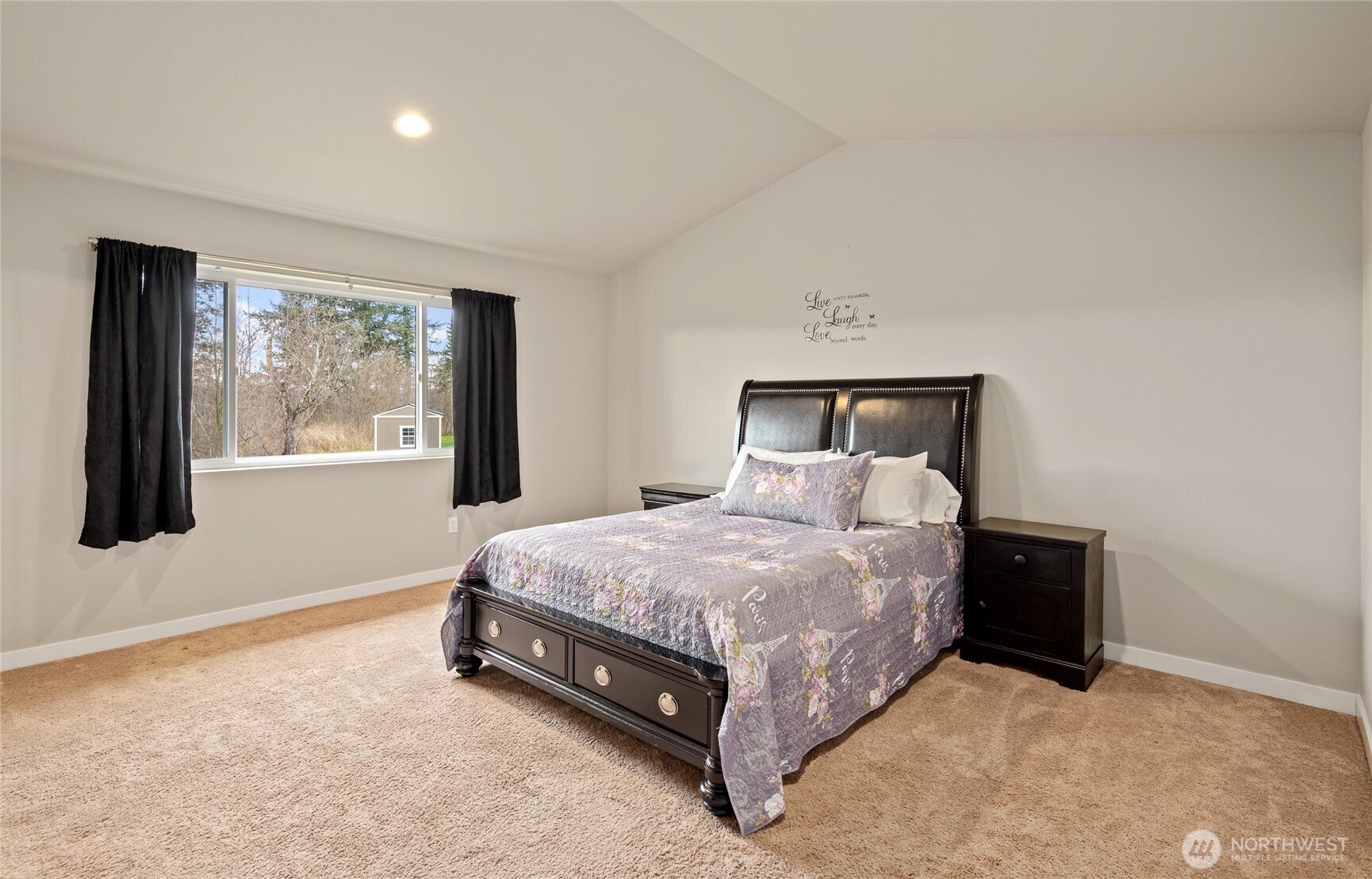 711 10th Street Sultan, WA 98294 - Photo 17 of 30 a bed sitting in a bedroom next to a window